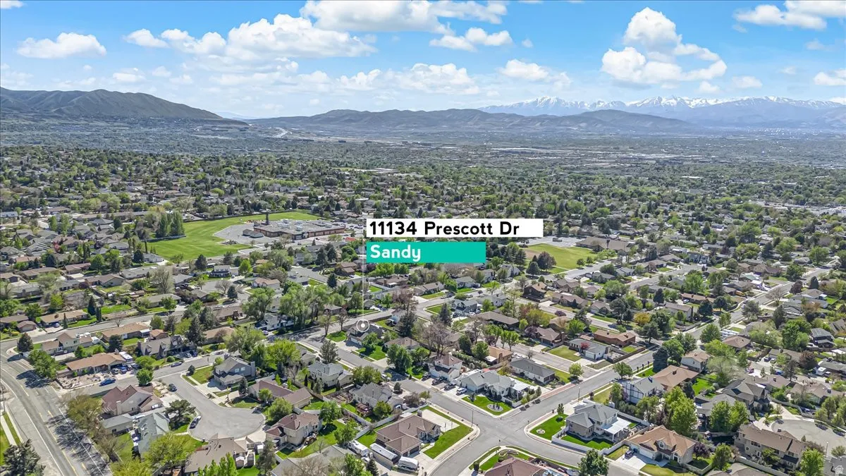 Aerial view of residential area with mountains