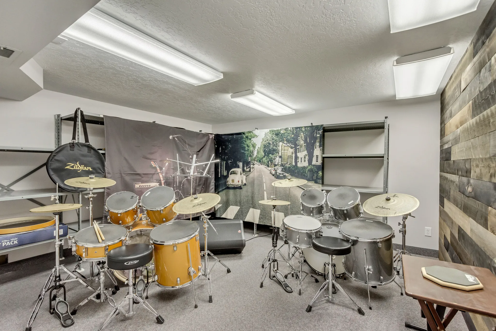 Rec room featuring a textured ceiling