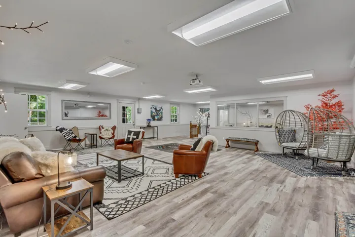 Living room with light wood-type flooring