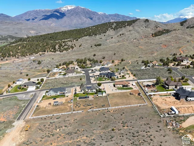 Aerial perspective of suburban area featuring mountains
