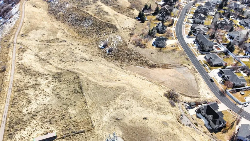 View of property location featuring nearby suburban area