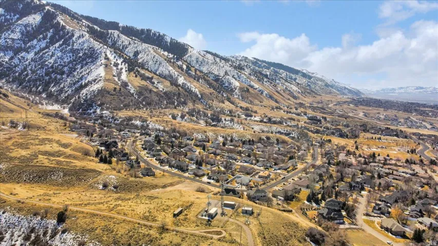View of mountain backdrop with nearby suburban area