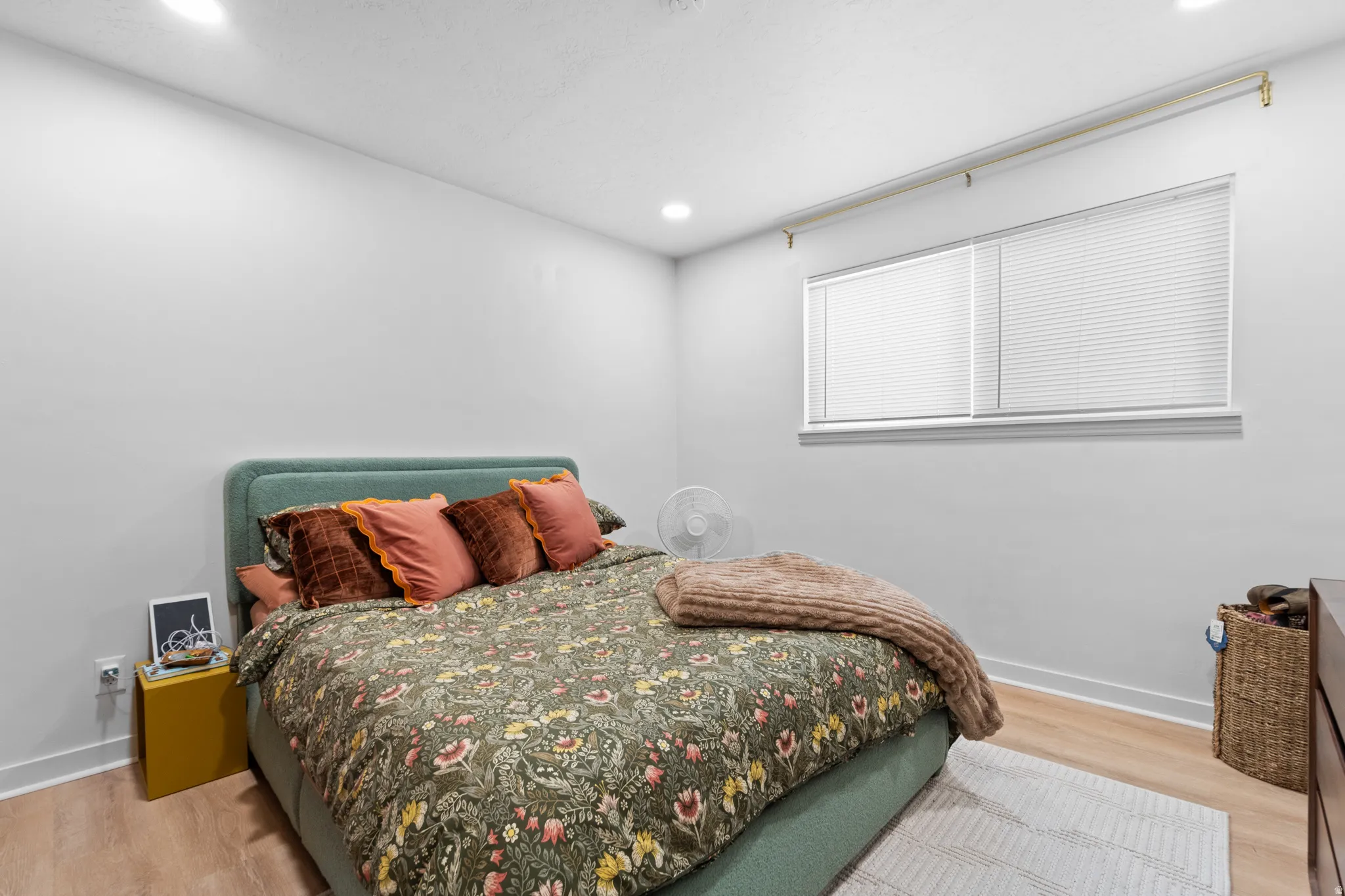 Bedroom featuring light wood-style flooring and recessed lighting