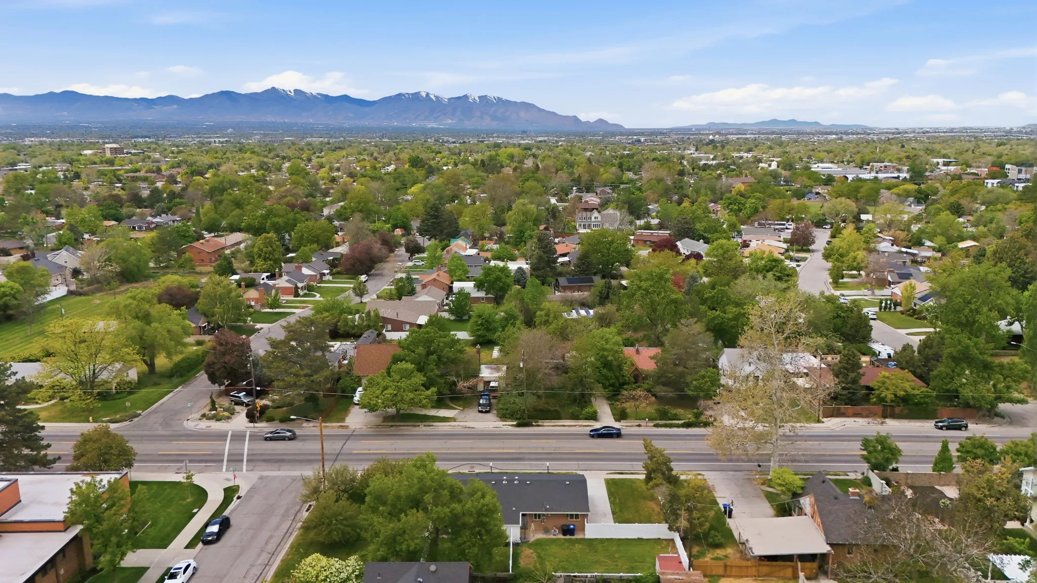 Aerial perspective of suburban area with mountains