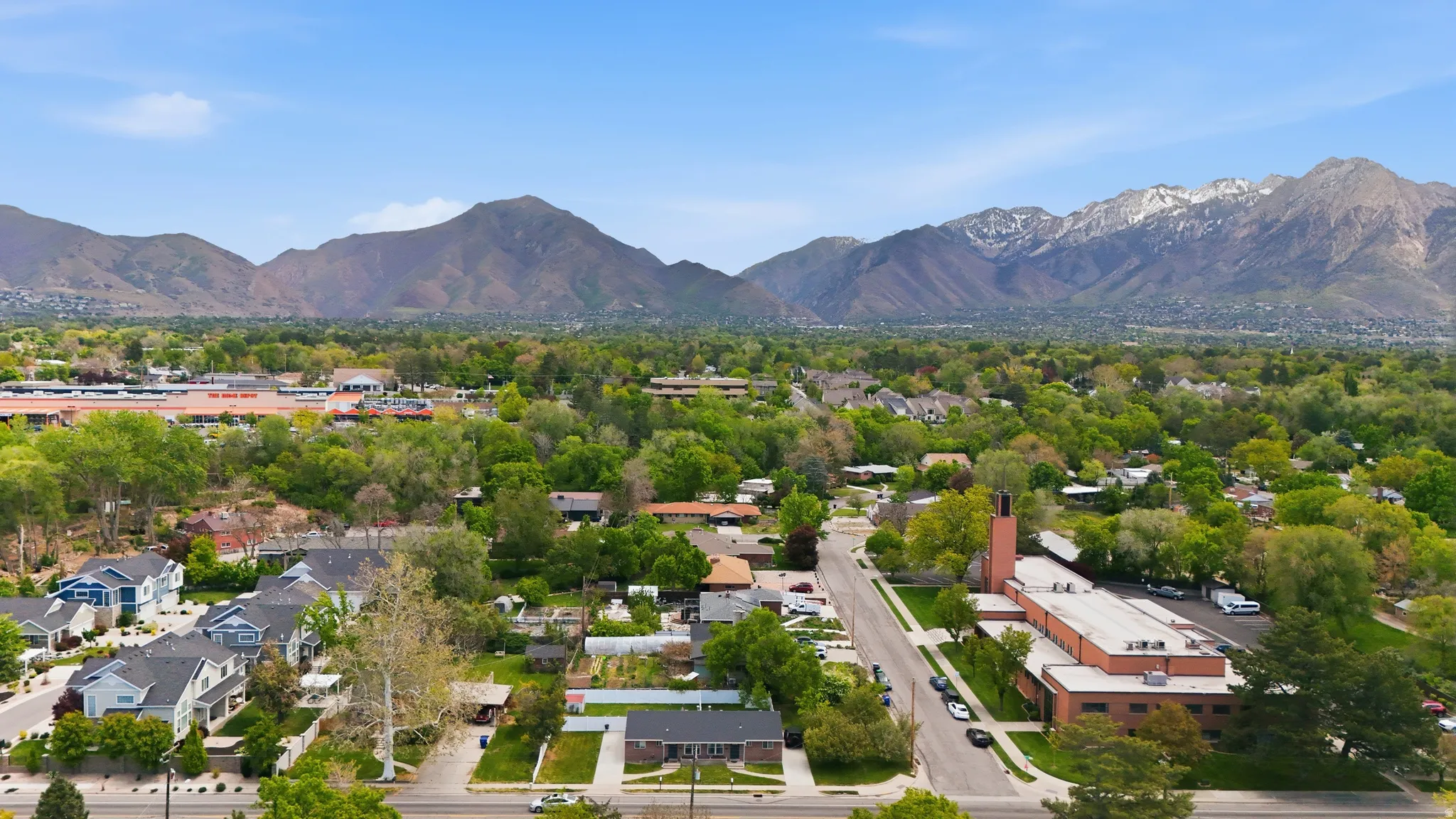 Aerial view of residential area with mountains