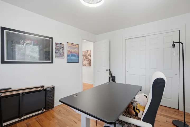 Home office featuring light wood-style flooring