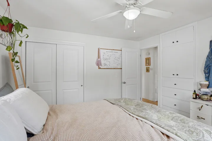Bedroom with a closet and ceiling fan