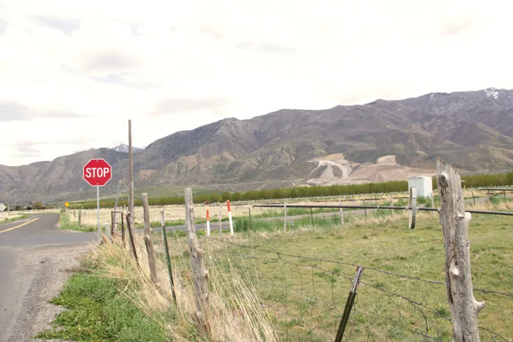 View of mountain background featuring rural landscape