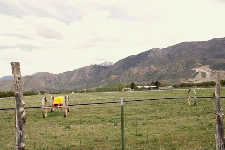 View of mountain background featuring rural landscape and agricultural land