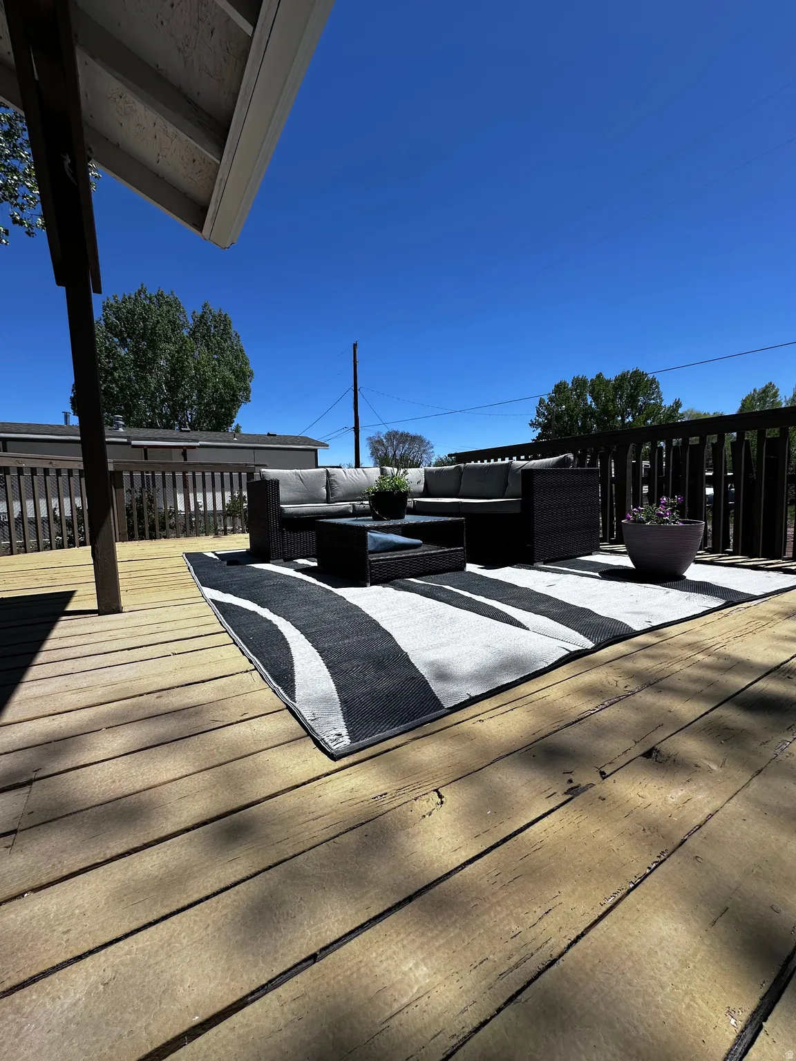Wooden deck with outdoor seating