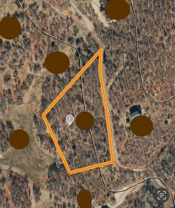 Aerial view of property's location featuring property parcel outlined