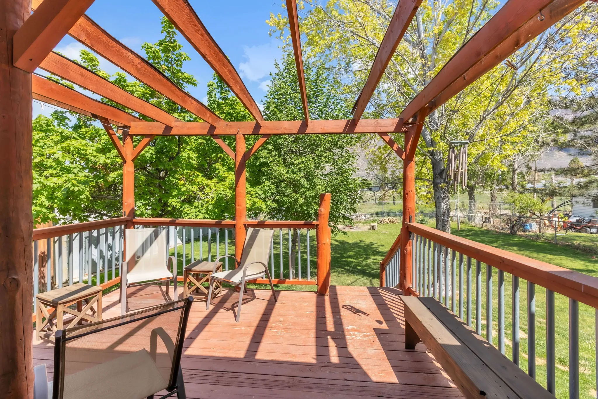 Wooden deck with a yard
