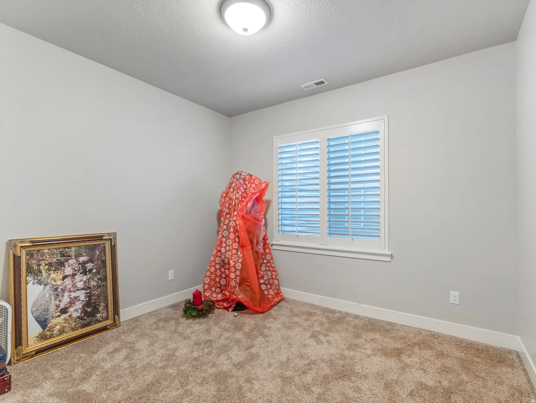 Playroom with carpet floors and baseboards