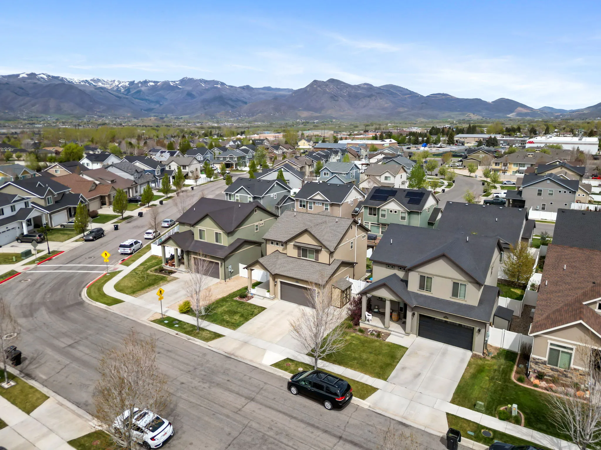 Aerial view of residential area with a mountainous background