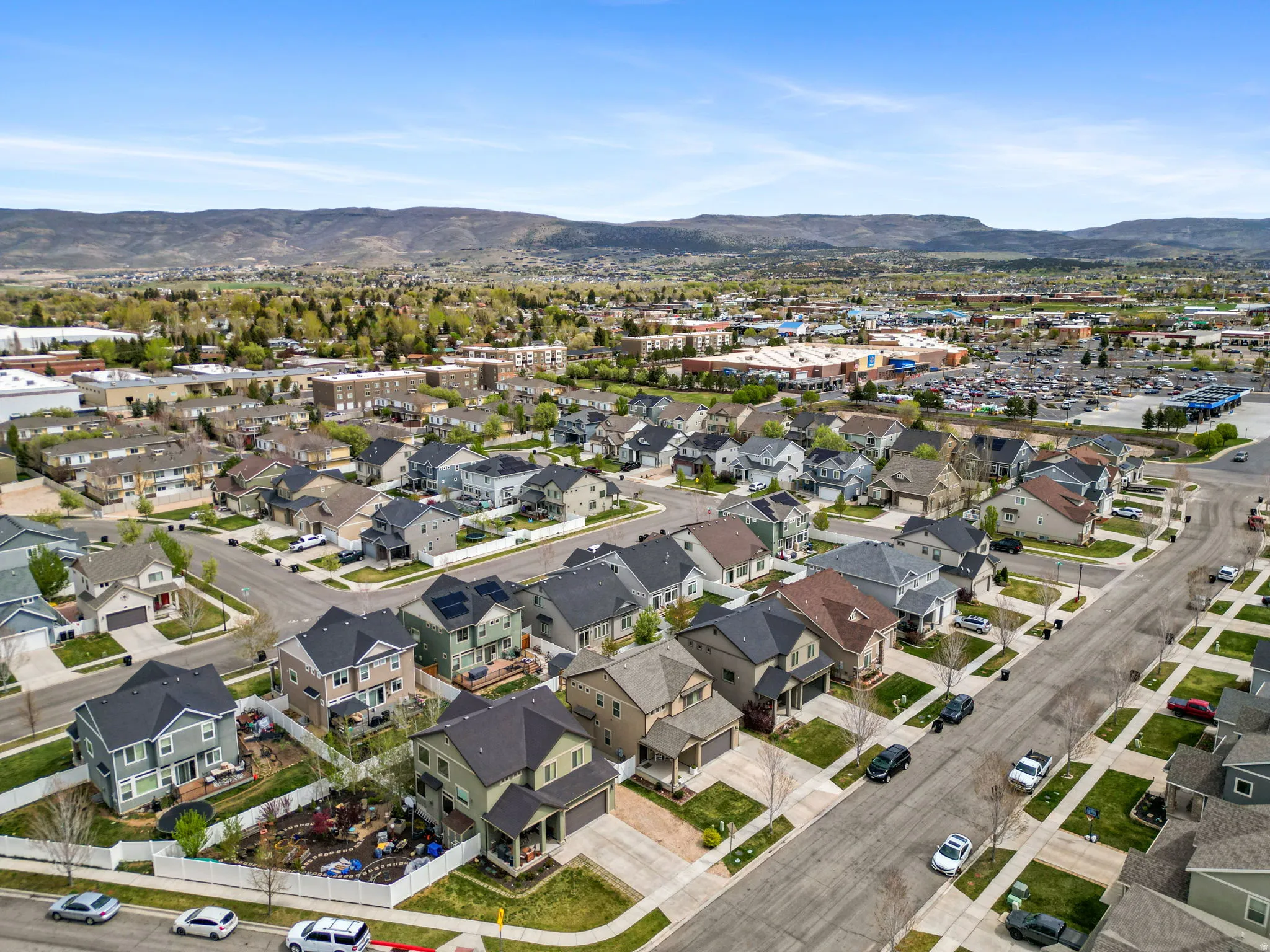 View of property location featuring a mountainous background and nearby suburban area