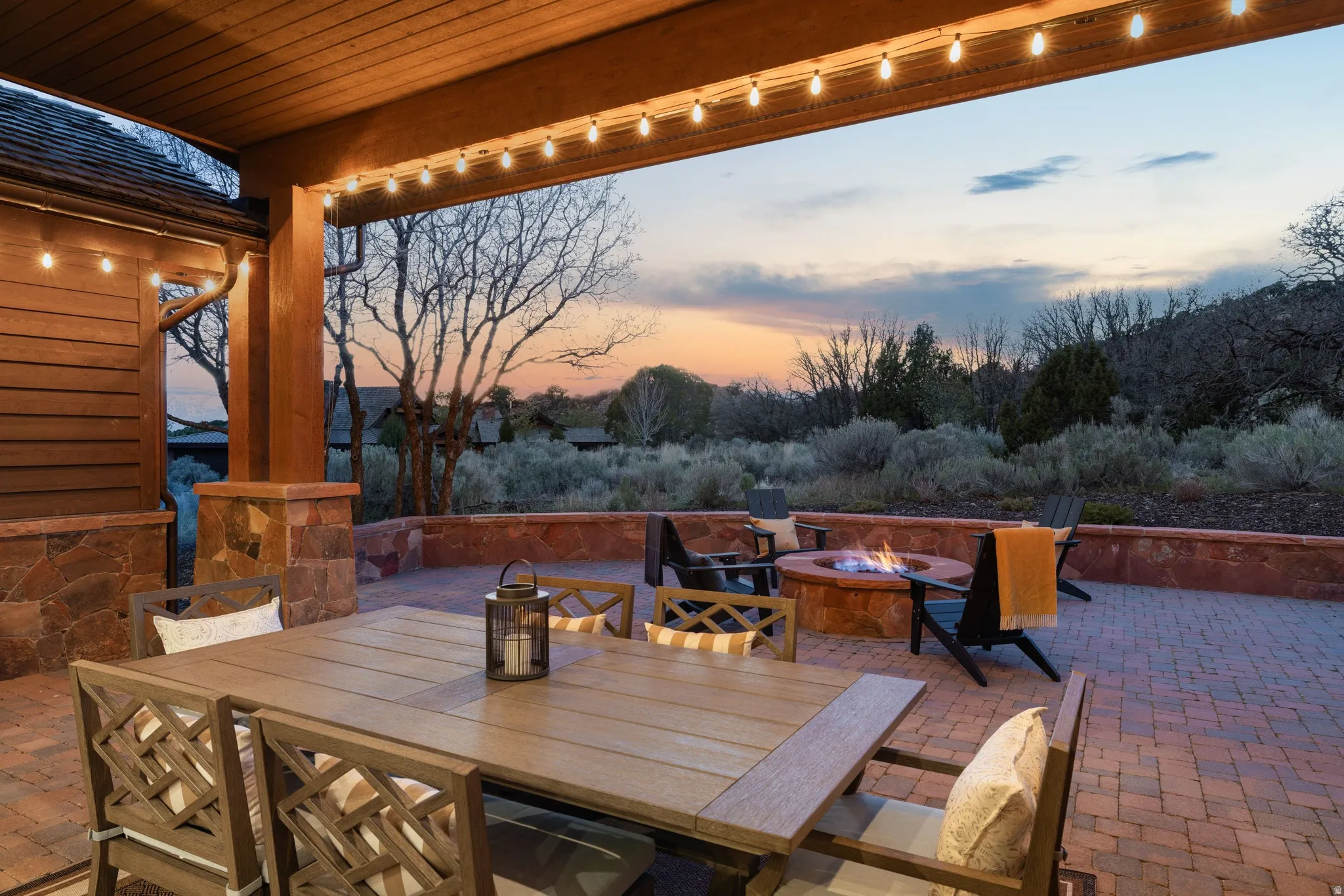 View of patio / terrace featuring an outdoor fire pit and outdoor dining space