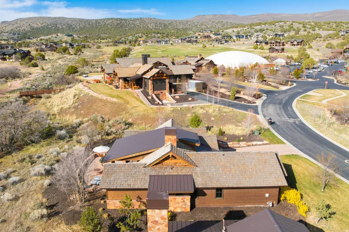 Aerial view of residential area featuring a mountain backdrop