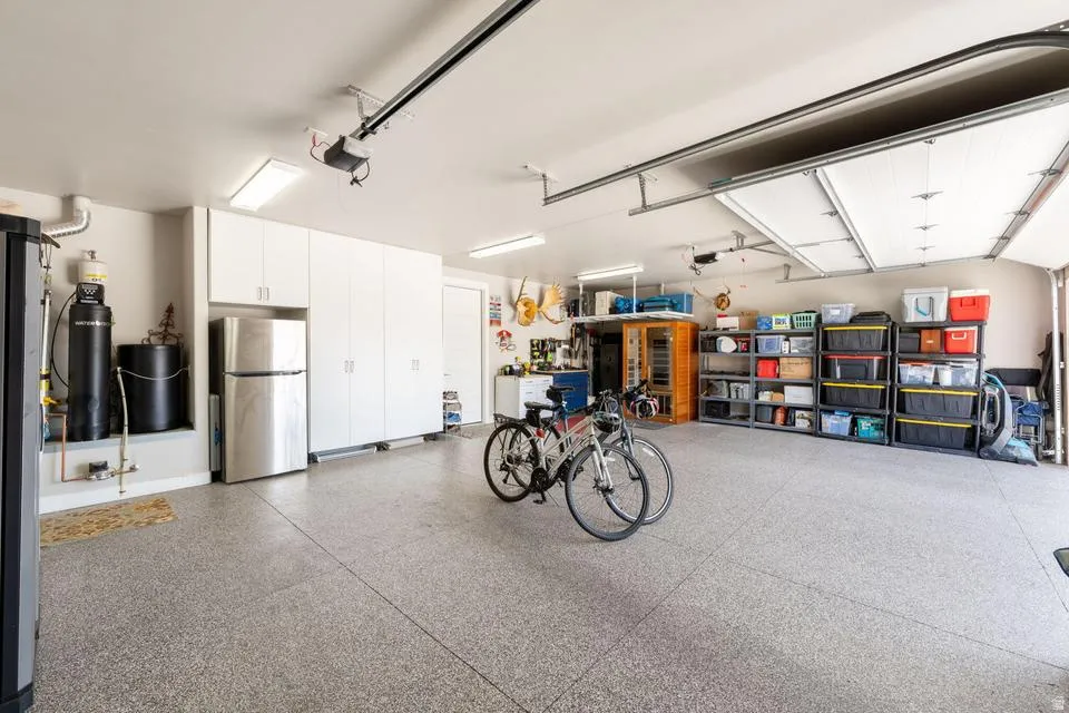 Garage with freestanding refrigerator