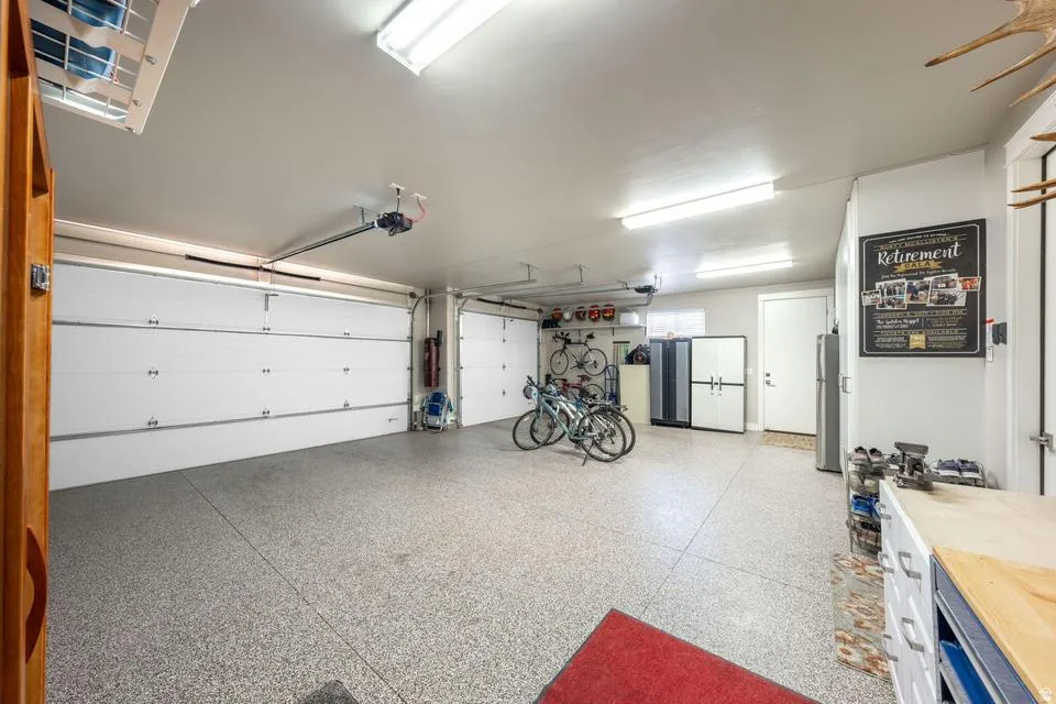 Garage with freestanding refrigerator