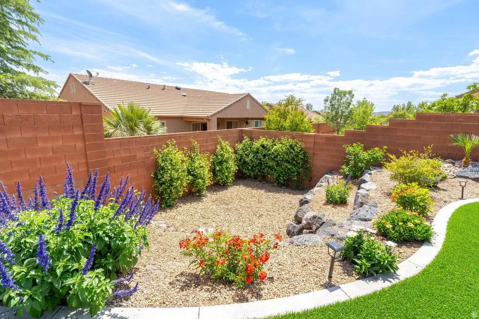 View of fenced backyard