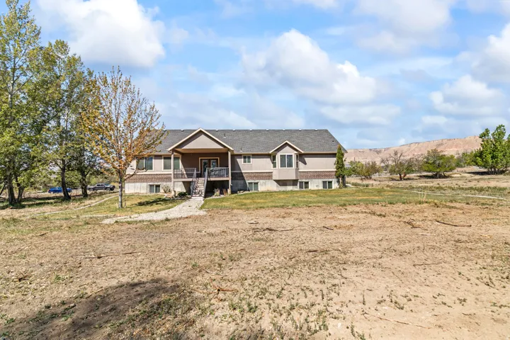 View of front of property with covered porch and stairs