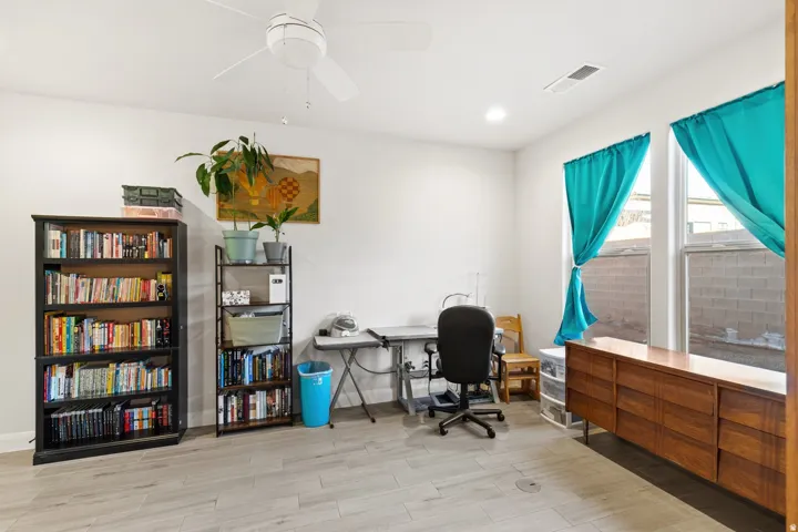 Office space with wood tiled floors, recessed lighting, and ceiling fan