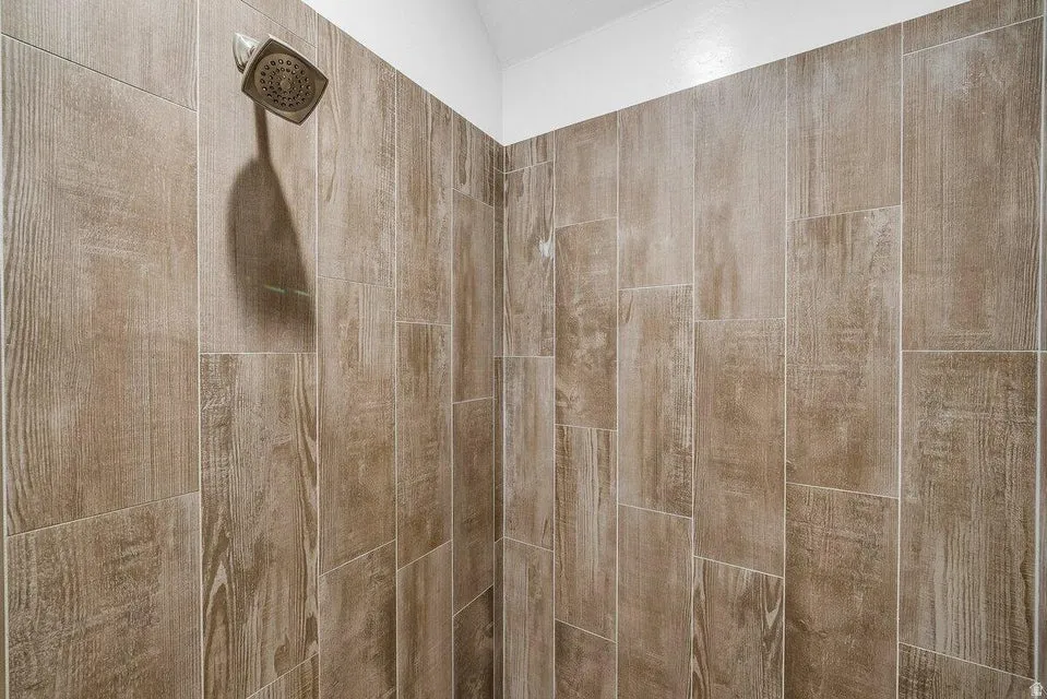 Bathroom view of tiled shower