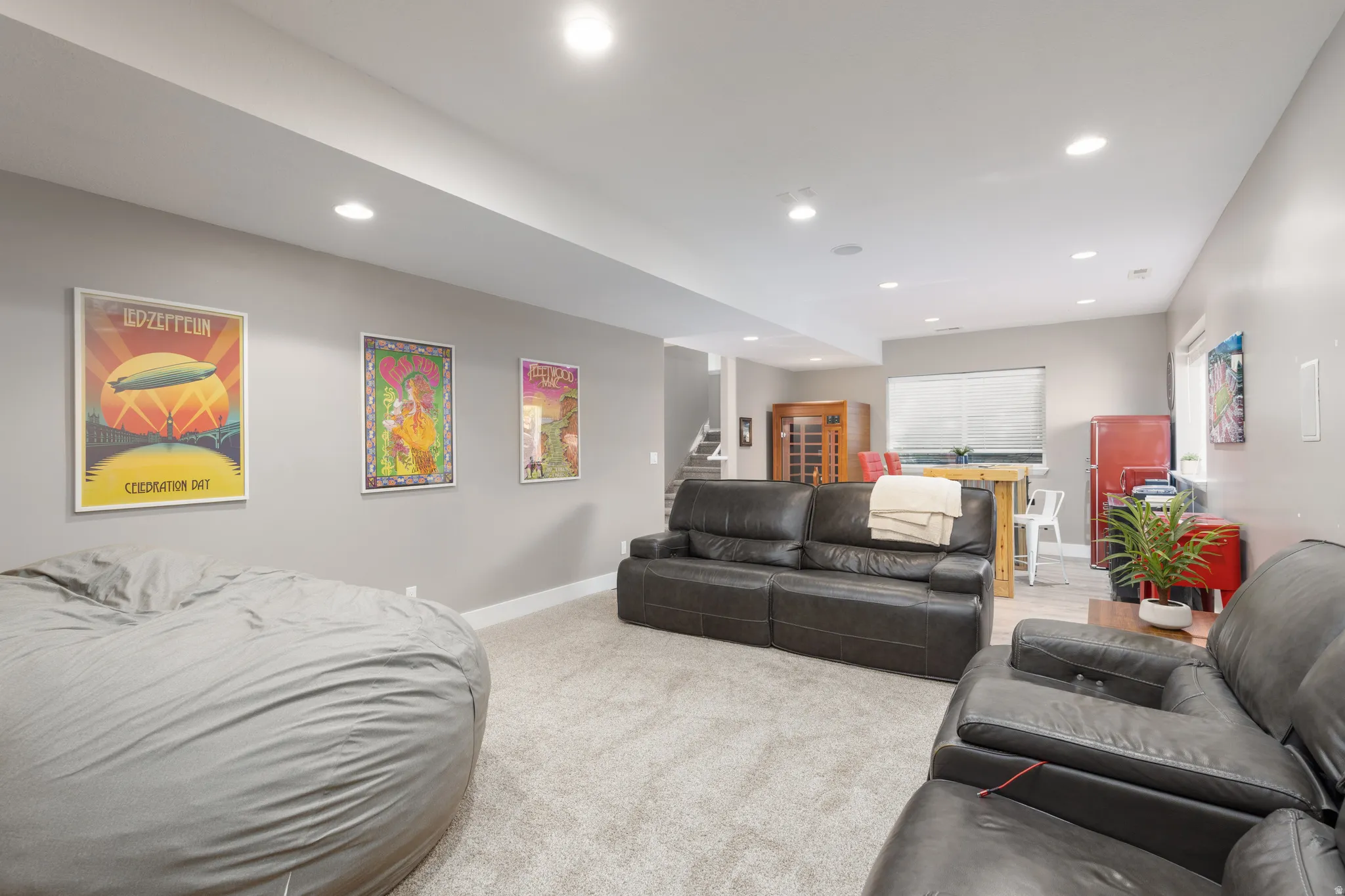Theater room- featuring light colored carpet and recessed lighting