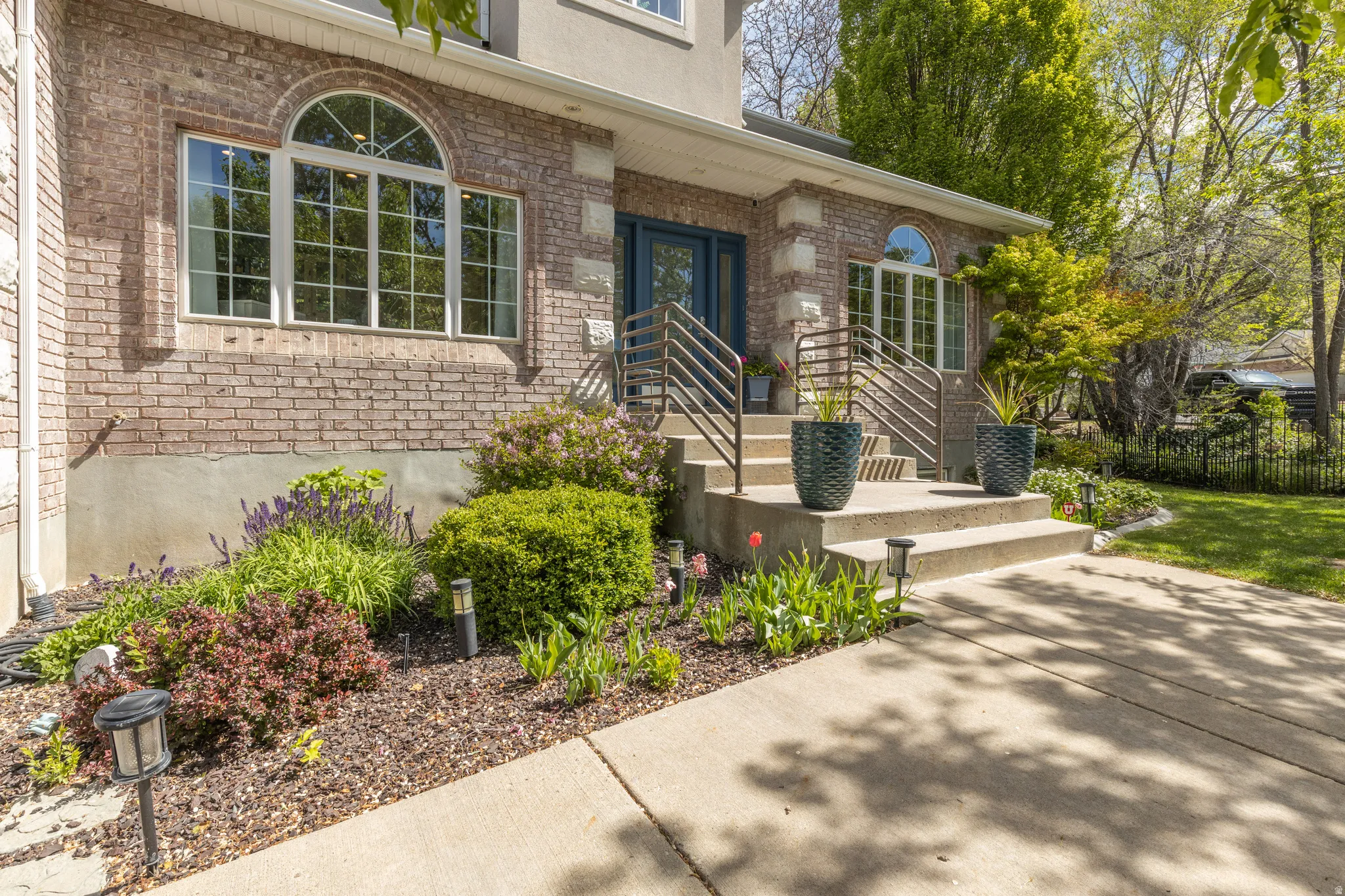 View of exterior entry with brick siding