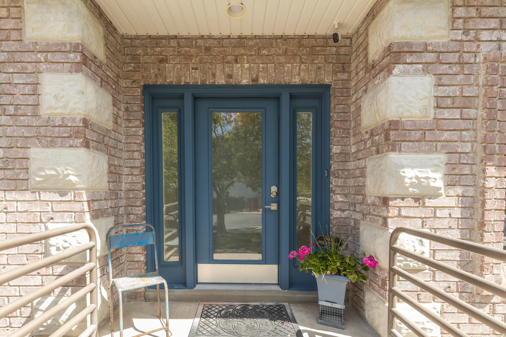 Entrance to property featuring brick.