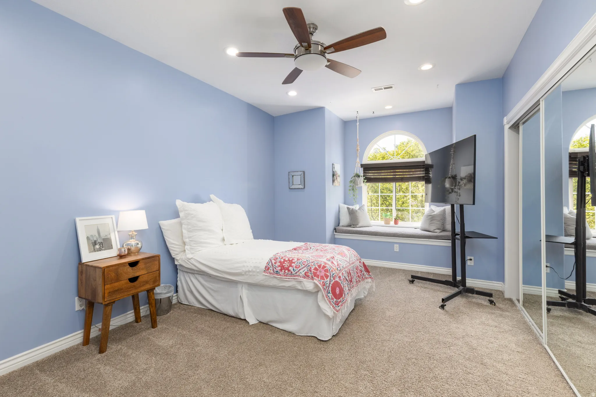 Bedroom with ceiling fan, light colored carpet, a closet, and recessed lighting