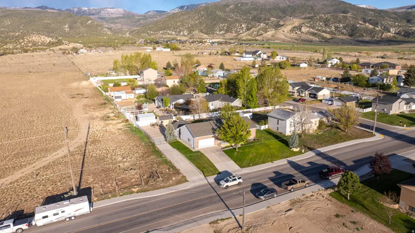 Aerial view of residential area featuring mountains