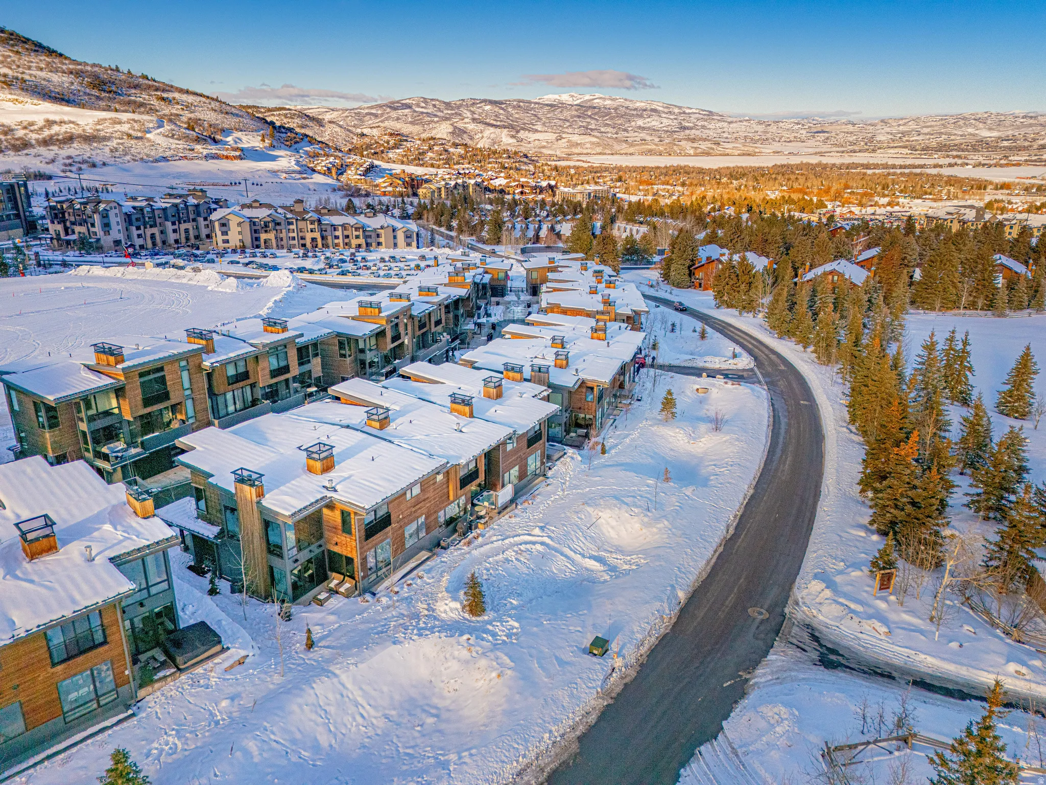 Snowy aerial view featuring a mountain view