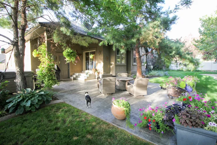 View of patio with an outdoor living space with a fire pit