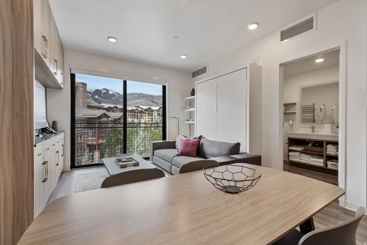 Dining room with recessed lighting and light wood-style floors