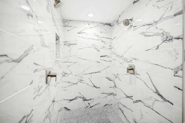 Full bathroom featuring a marble finish shower
