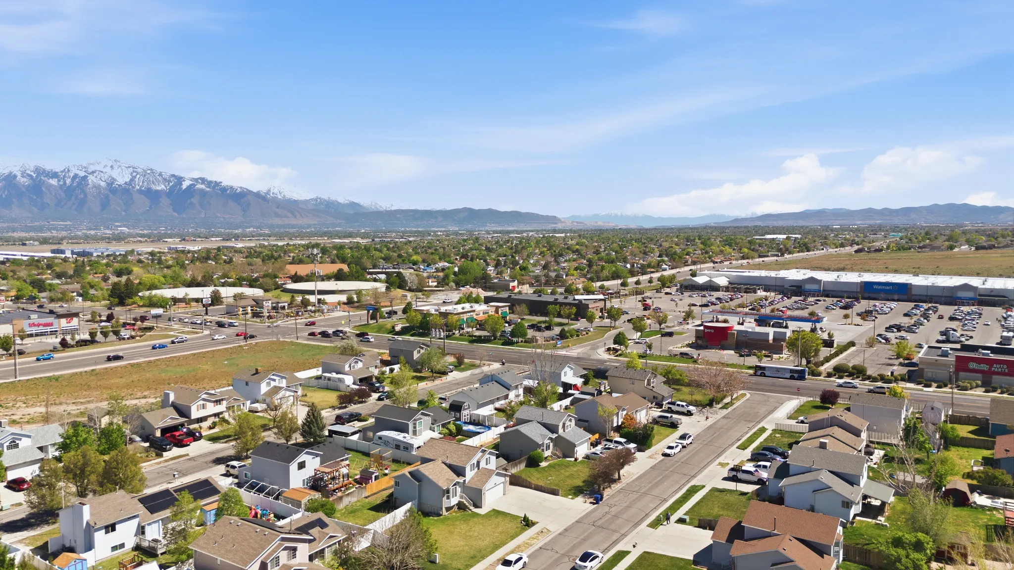 Aerial view of residential area with a mountainous background