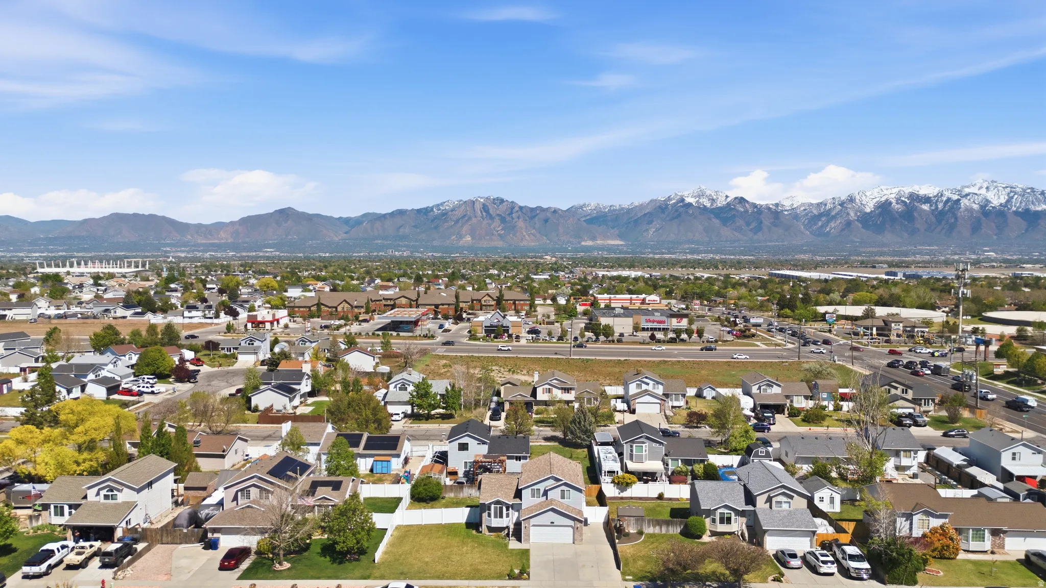 Aerial perspective of suburban area with mountains