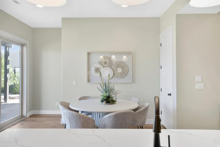 Dining area featuring wood finished floors and baseboards