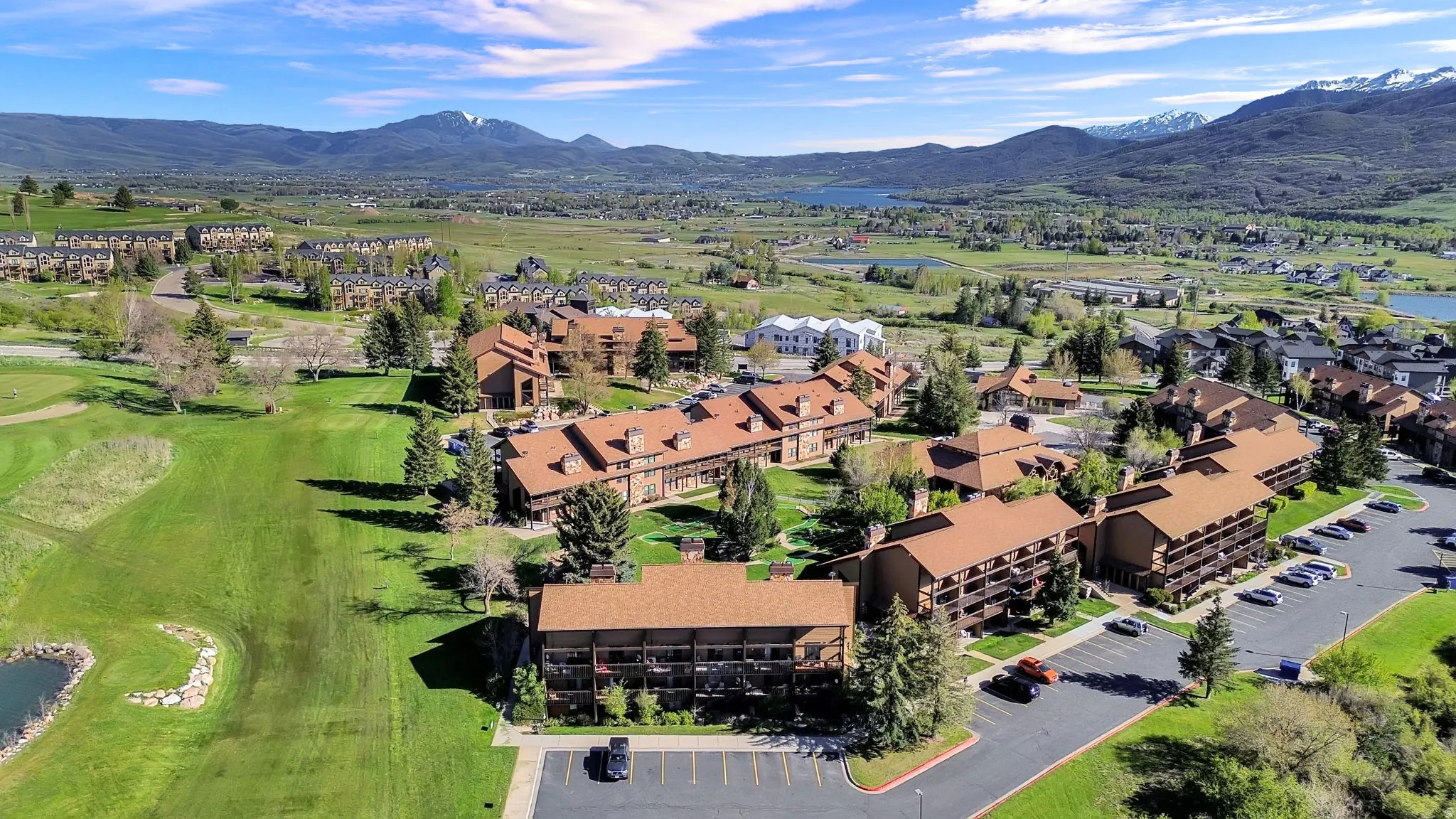 Aerial Deck view of building 4 and parking, off of the golf course