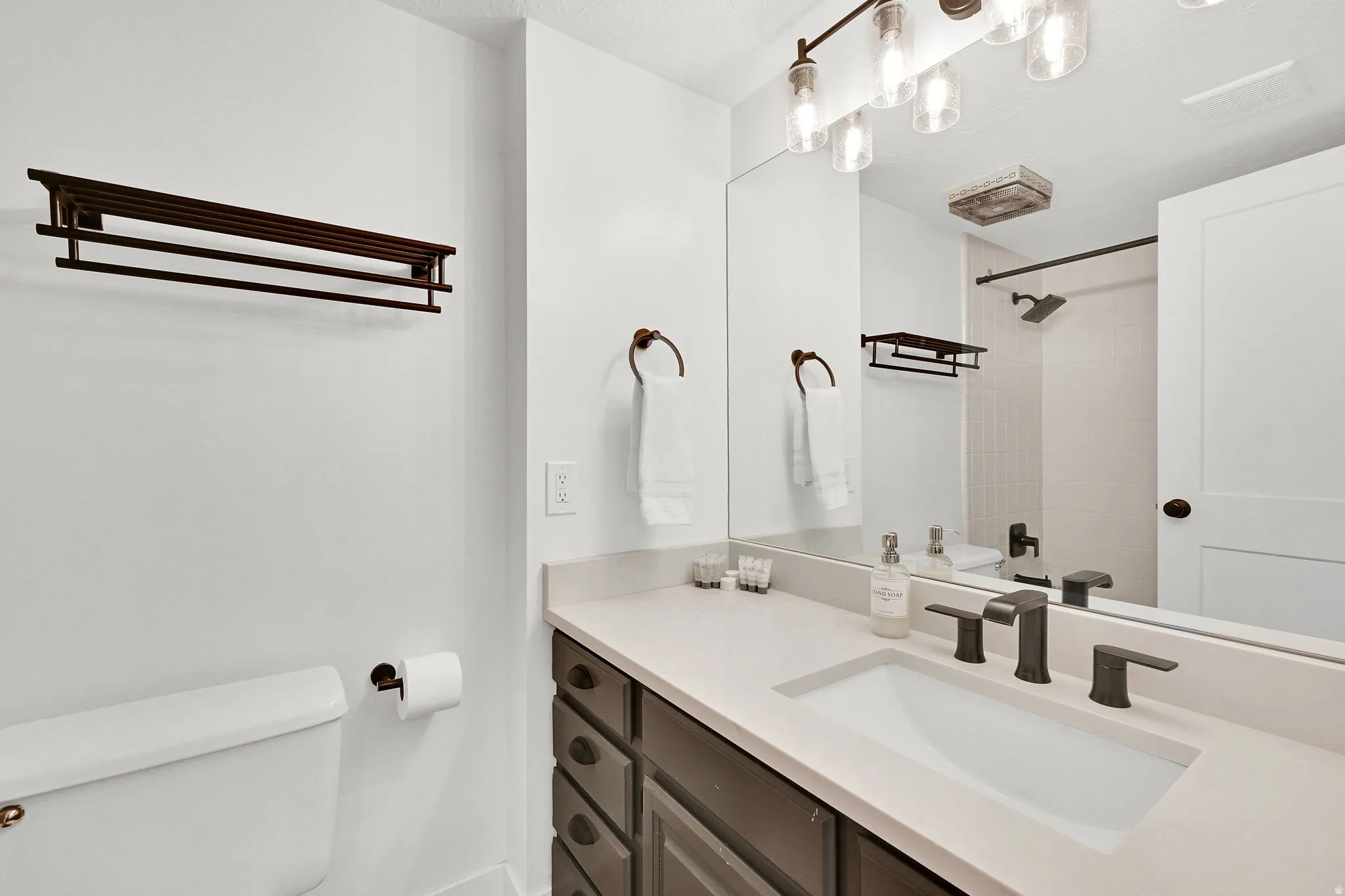 Full bathroom featuring vanity and a shower/tub combo