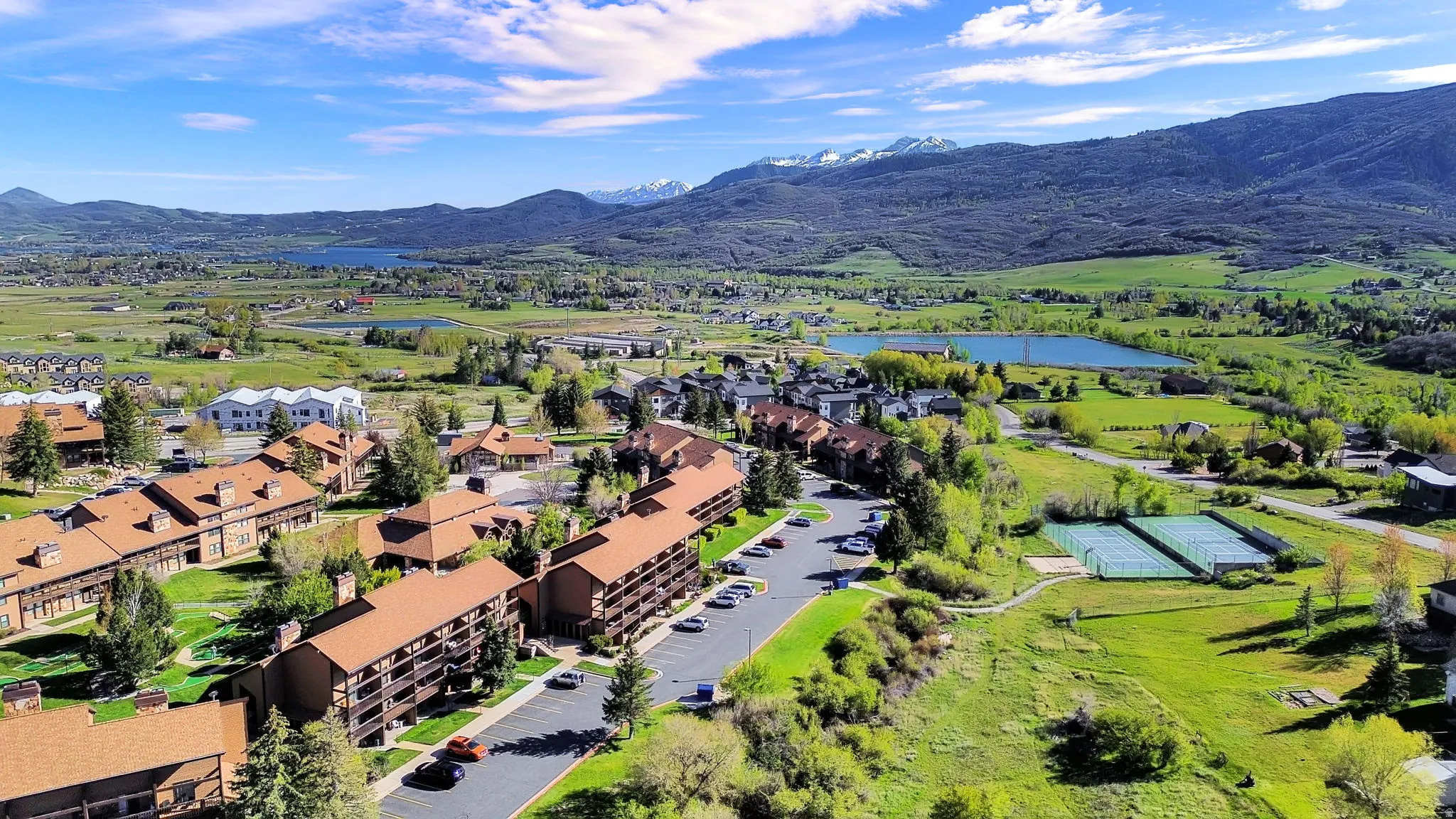 Aerial of the community taken above the course looking inward to amenities