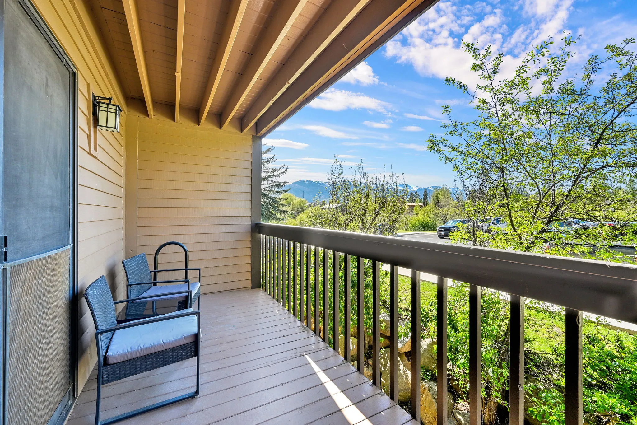 Balcony with mountain and golf course views