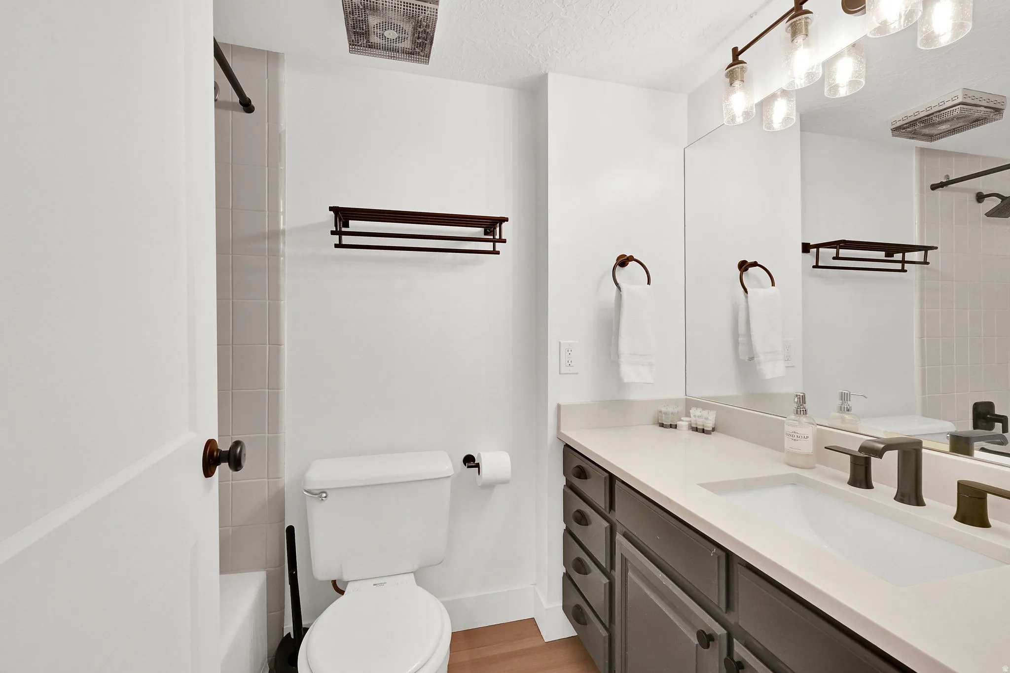 Full bathroom featuring vanity and a shower/tub combo