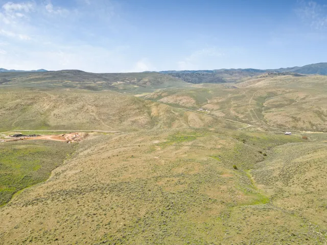View of rural area with a mountain backdrop