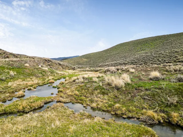 View of mountain background with a large body of water