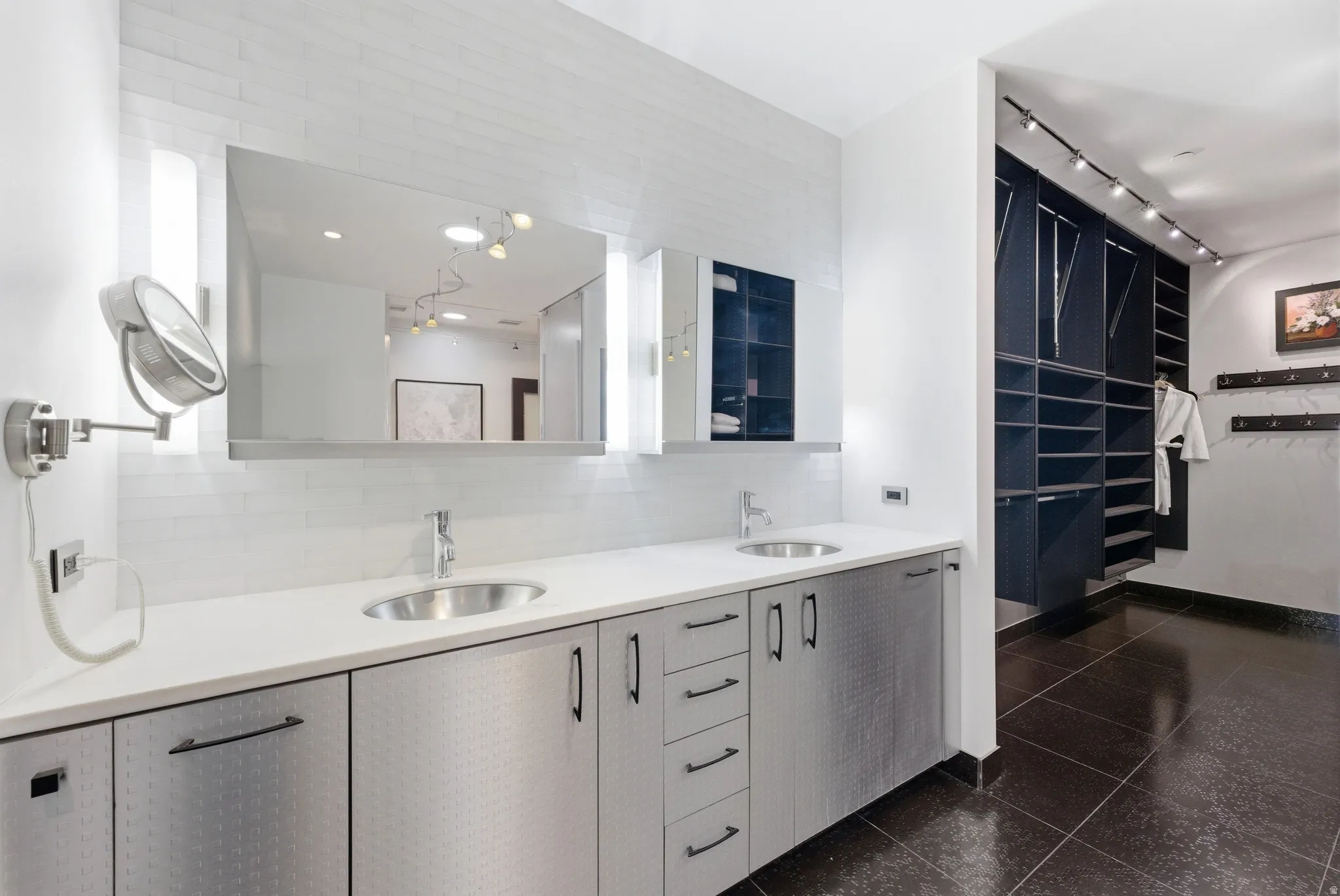 Dual vanity with undermount sinks and contemporary faucets