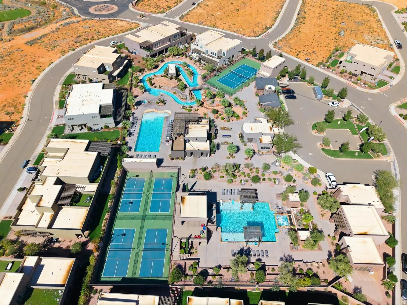 Aerial view of property and surrounding area with a pool area