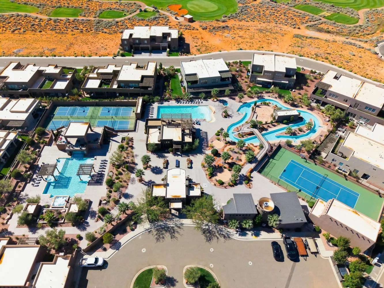 Aerial overview of property's location with a golf club