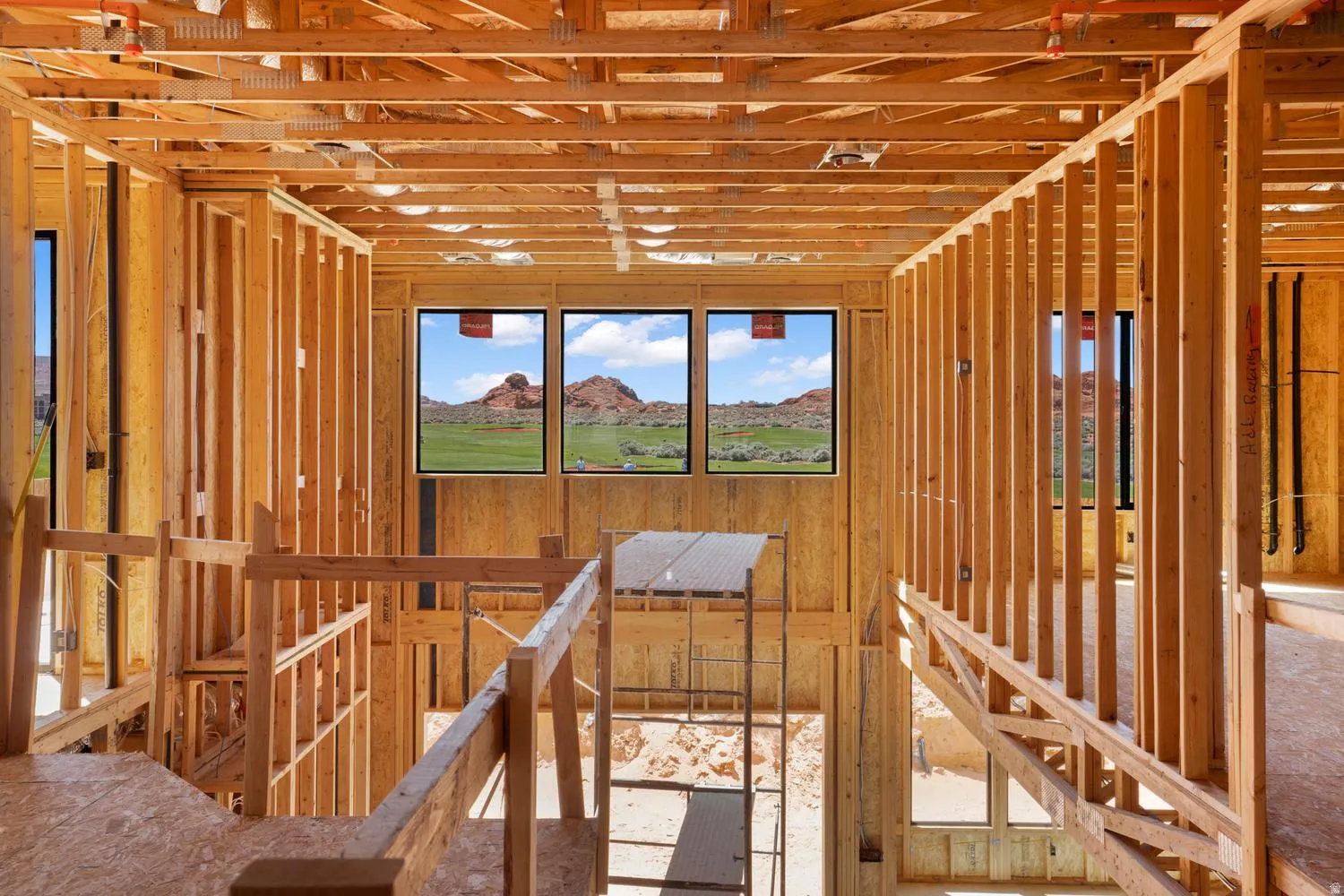 Miscellaneous room with an upstairs landing and a mountain view